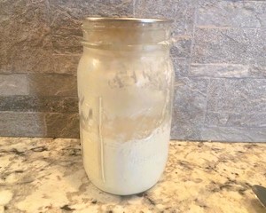 sourdough discard in jar on countertop